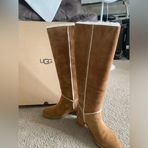 Ugh Boots. Below the knee. Beautiful and new. Worn once. In its original box.